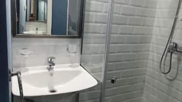 Shower, free toiletries, towels, soap
