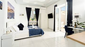 Tabla de planchar con plancha, wifi gratis, ropa de cama