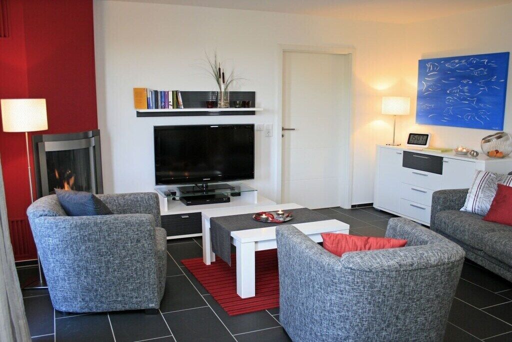 Smart TV, fireplace, DVD player, books