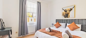 Five-bedroom Victorian townhouse in central Norwich, built for contractor teams. 8 separate beds, 5 bedrooms, 2 off-street parking spaces big enough for vans. 2 great ale pubs across the road. House next door also ours for bigger teams.