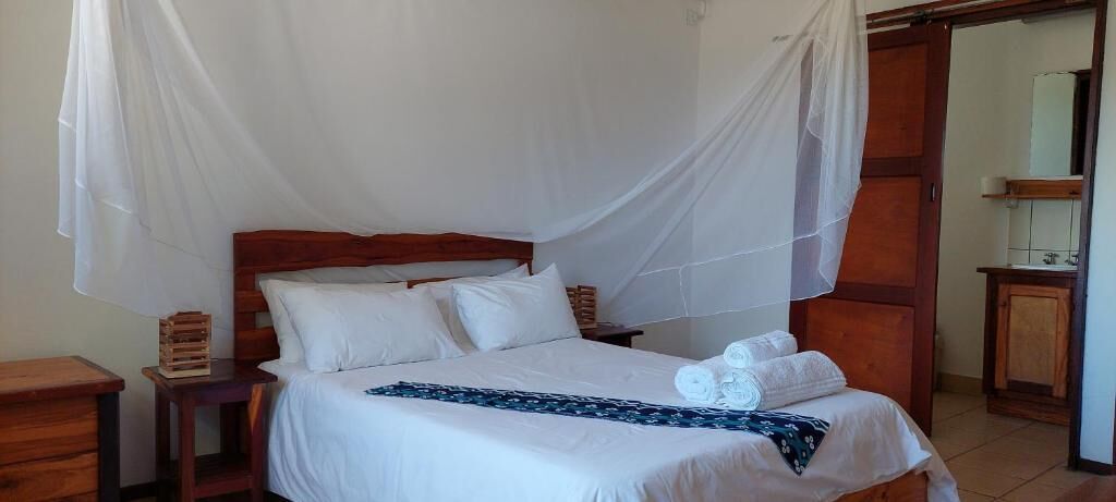 Deluxe Chalet, Patio, Beach View | In-room safe, individually furnished, iron/ironing board, WiFi