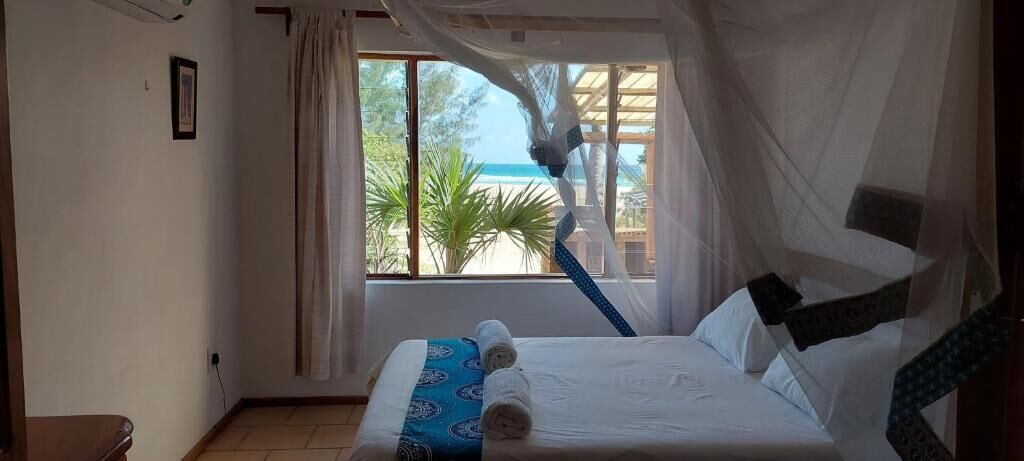 Deluxe Chalet, Patio, Beach View | In-room safe, individually furnished, iron/ironing board, WiFi
