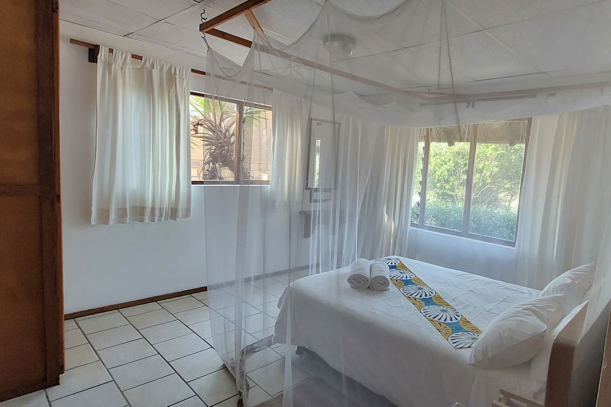 Deluxe House, Patio, Beach View | In-room safe, individually furnished, iron/ironing board, WiFi
