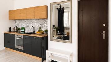 Classic Apartment, Air conditioning | Private kitchen | Espresso maker, electric kettle, highchair, griddle