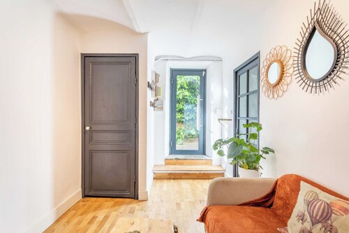 Charmant appartement 1 chambre/2 salles de bain avec jardin