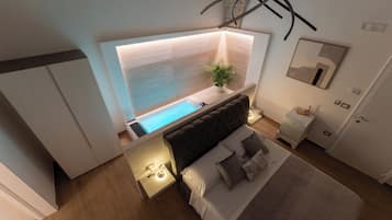 A modern bedroom with a bed, bedside table, nightstand, and a small window.