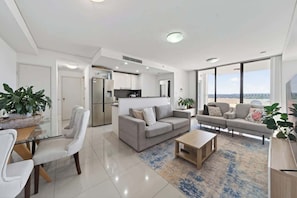 TV, offices - The Viewpoint | Elegant 2BR Stay with Parking (Parramatta)