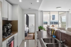 Fridge, microwave, oven, stovetop - The Viewpoint | Elegant 2BR Stay with Parking (Parramatta)