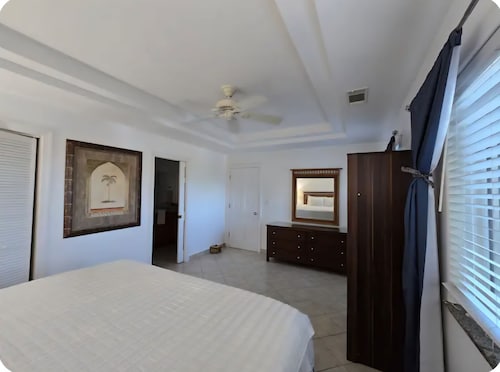 Spacious luxury suite in exclusive gated community steps from Grace Bay Beach.