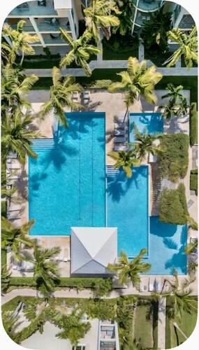 Spacious luxury suite in exclusive gated community steps from Grace Bay Beach.