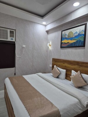 Deluxe Room | Desk, laptop workspace, blackout drapes, iron/ironing board - Blueberry Premium (Greater Noida)