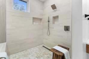 Shower, hair dryer, bidet, towels