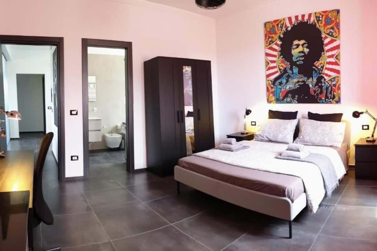 Habitación Deluxe con 1 cama matrimonial o 2 individuales, vista al patio | Cortinas blackout y wifi gratis