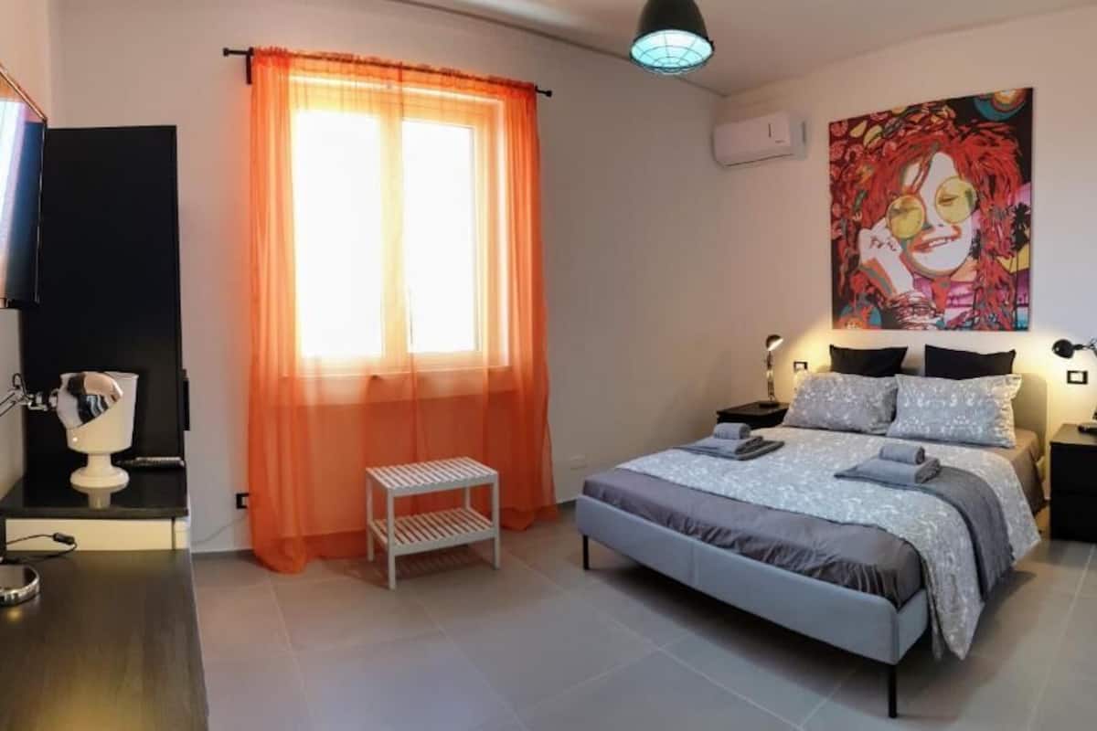 Habitación doble Confort, vista al jardín | Cortinas blackout y wifi gratis