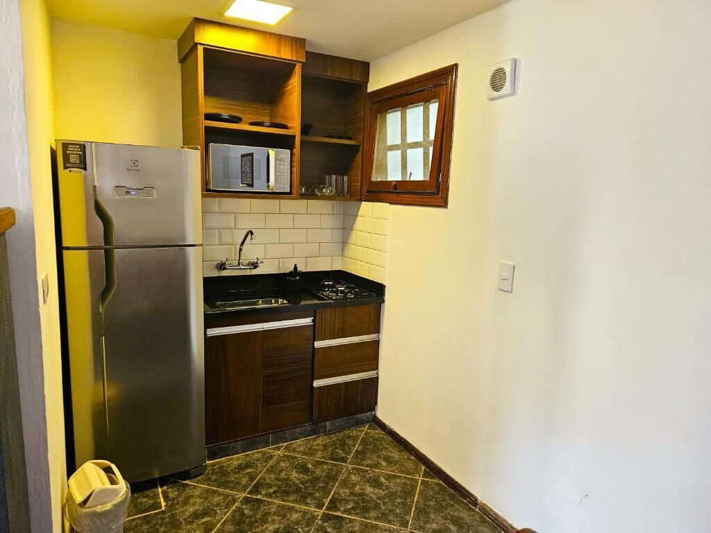Chalé família, varanda coberta, vista para o pátio | Cozinha privada