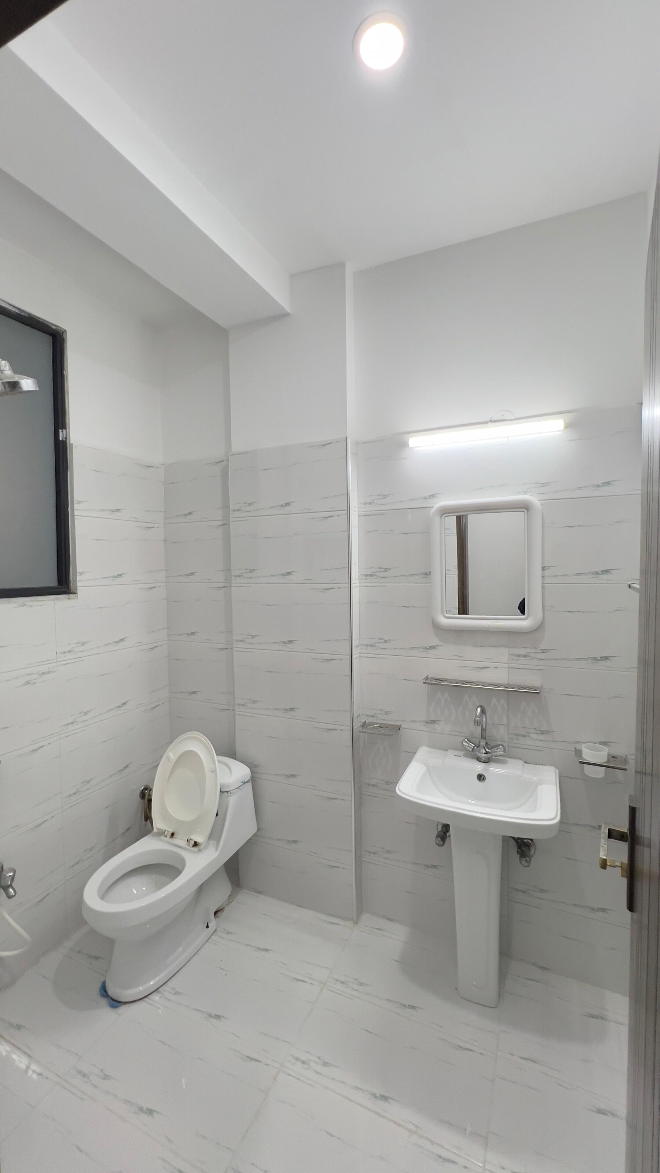 Bidet, towels, soap, toilet paper