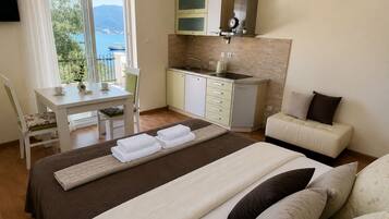 Superior Studio, Patio, Sea View | Iron/ironing board, free WiFi