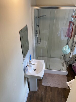 Separate tub and shower, deep soaking tub, towels