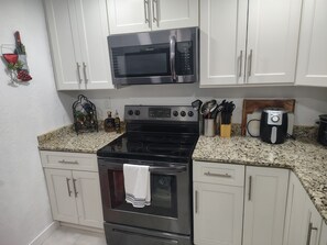 Fridge, microwave, oven, stovetop - SWFL CONDO FUN - Relax and Unplug lots of extras (Fort Myers)