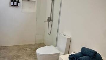 Double Room, Patio, Garden View | Bathroom | Shower, hair dryer, towels, soap