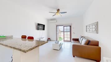 Apartament, 1 llit de matrimoni i sofà llit, vistes a l'oceà (Jr Suite 2 - Playa Arcangel) | Sala d'estar