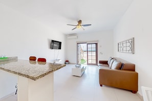Apartment, 1 Queen Bed with Sofa bed, Ocean View (Jr Suite 2 - Playa Arcangel) | Living area - Dog-friendly Suite With Hot Tub, Kitchenette, Heated Outdoor Pool, Private Patio (Playas de Rosarito)