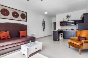 Apartment, 1 Queen Bed with Sofa bed, Partial Ocean View (Jr Suite 6 - Playa Arcangel) | Living area - Dog-friendly Suite With Beach Views, Outdoor Pool, Patio, Kitchenette, & AC (Playas de Rosarito)