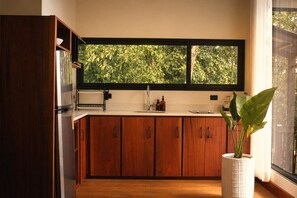 Fridge, microwave, stovetop, coffee/tea maker
