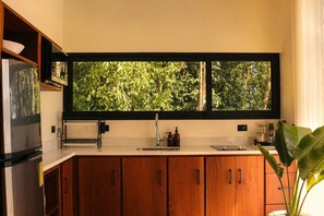 Fridge, microwave, stovetop, coffee/tea maker