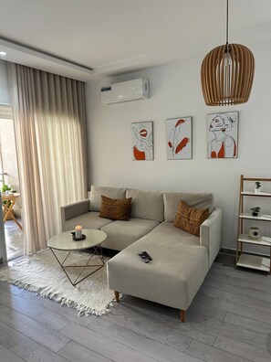 Apartment, 1 Bedroom, Accessible, Smoking | Living area - Cozy Hammamet Apartment Beach, Pool, and Comfort Await (Hammamet)
