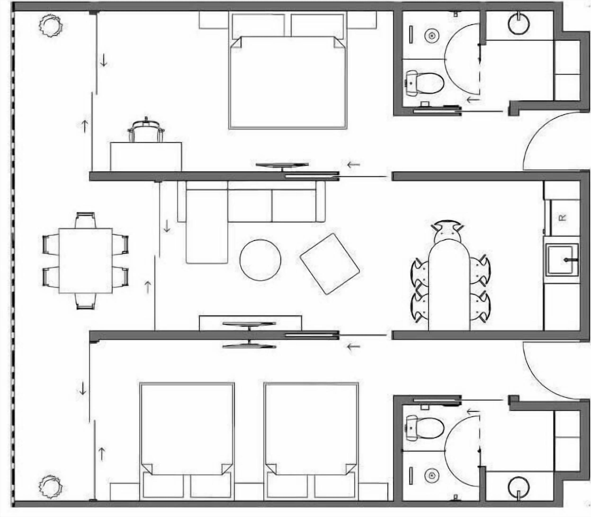 Plano de planta que muestra un comedor, cocina, dos dormitorios y un baño.