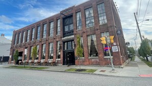 A brick building with large windows, a storefront, and outdoor seating. - Superb Mid Hudson Valley Newburgh for relaxing stays North of U S ARMY WEST PT. (Newburgh)