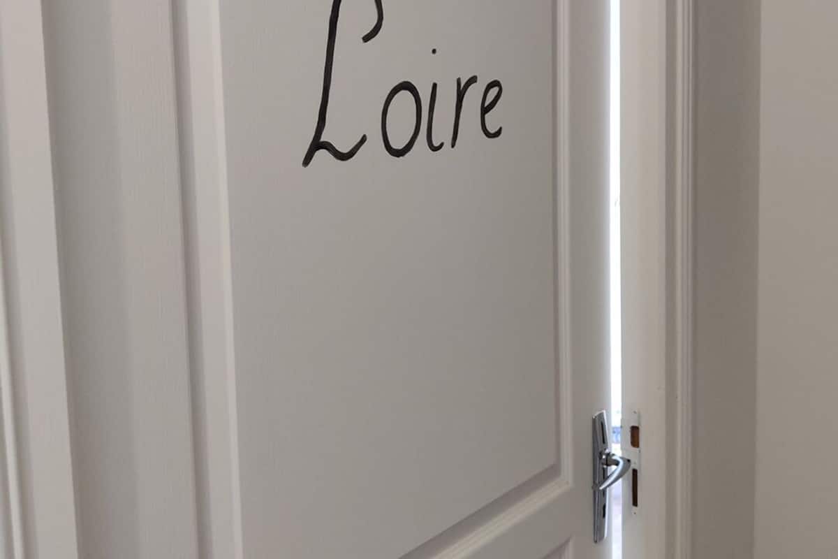 A door with the name 'Loire' written on it.