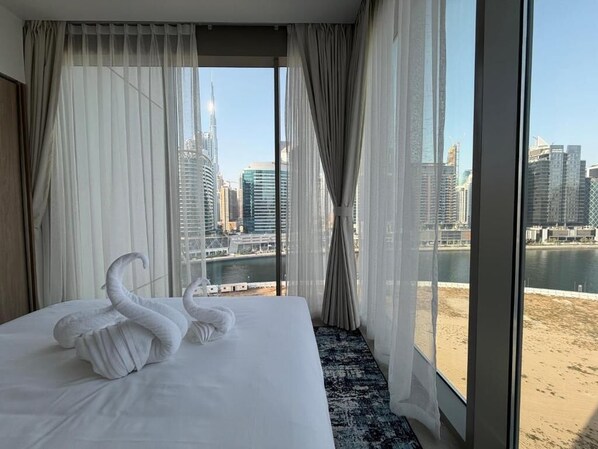 Apartment, Balcony, Canal View | In-room safe, soundproofing, iron/ironing board, free WiFi - Heaven's Dreams Peninsula 3 Business Bay (Dubai)
