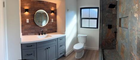 Shower, towels, soap, toilet paper
