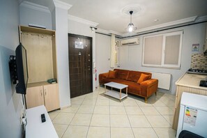Apartamento standard, sacada | Área de estar