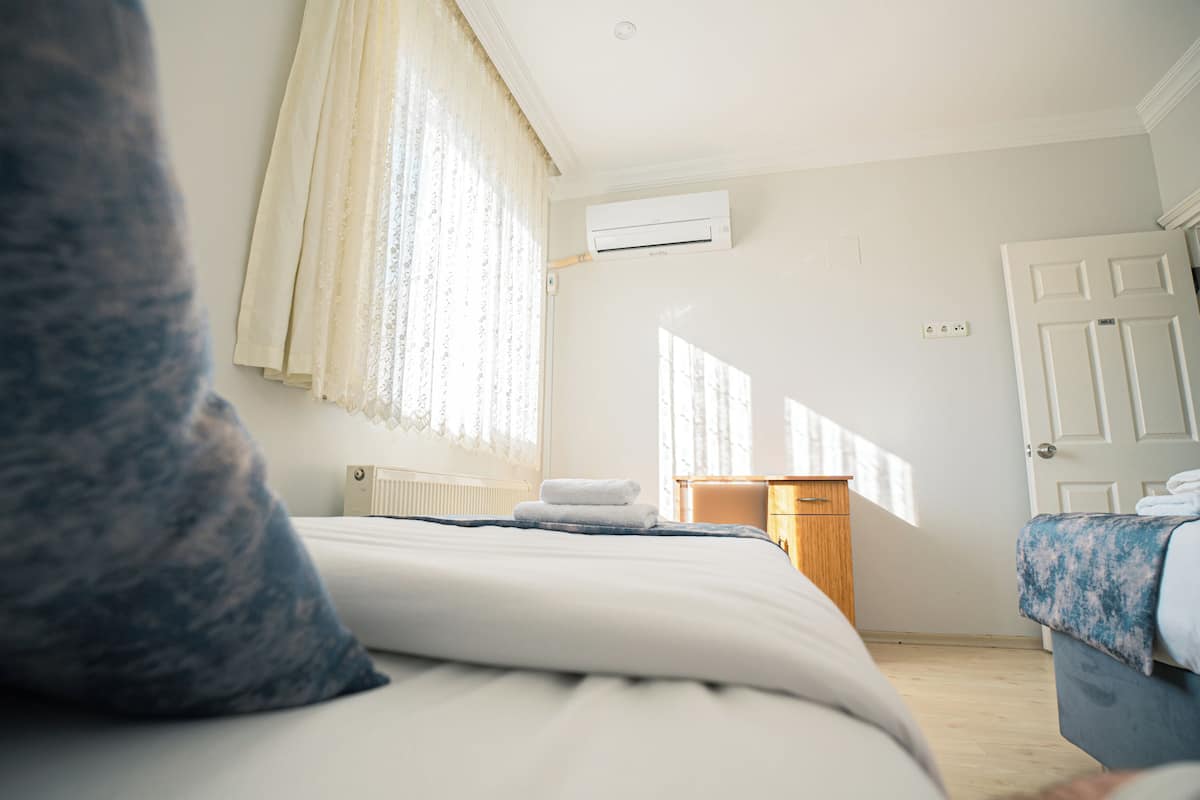 Ropa de cama de alta calidad, camas Select Comfort y cortinas blackout
