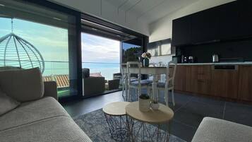 Apartamento de lujo, vistas al mar | Zona de estar