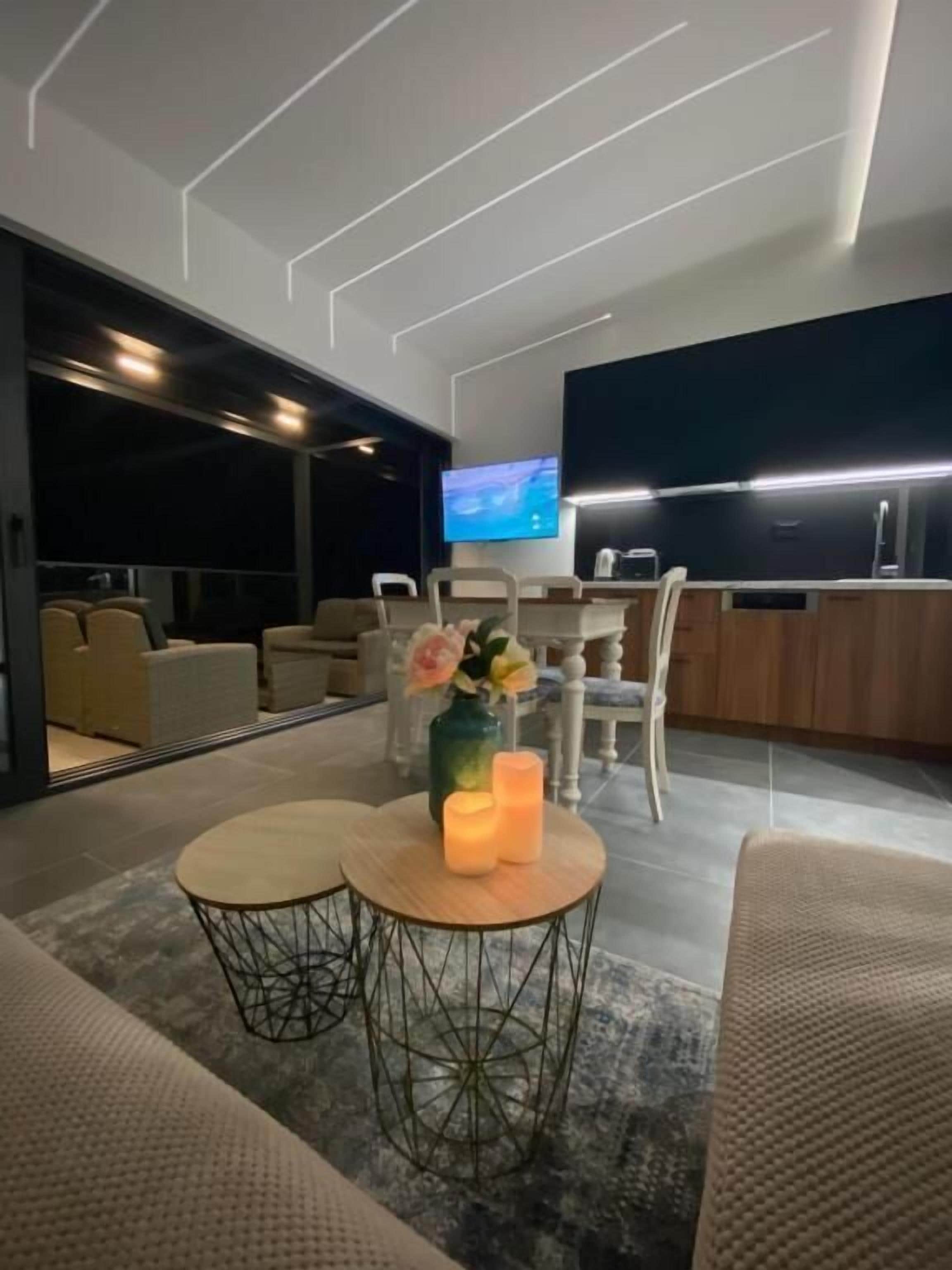 Luxury Apartment, Sea View | Living area | Flat-screen TV