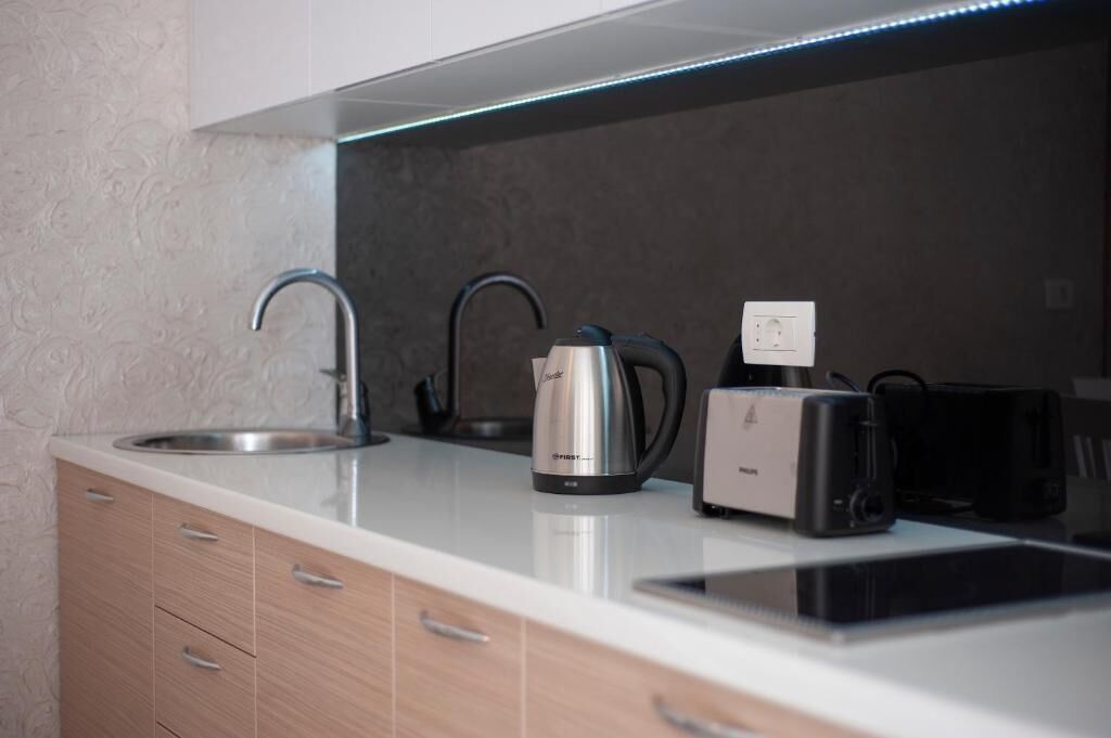 Apartamento família, vista para a piscina | Cozinha privada