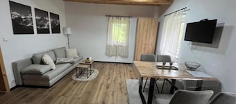 Apartment with mountain view and garden. Family & pet friendly