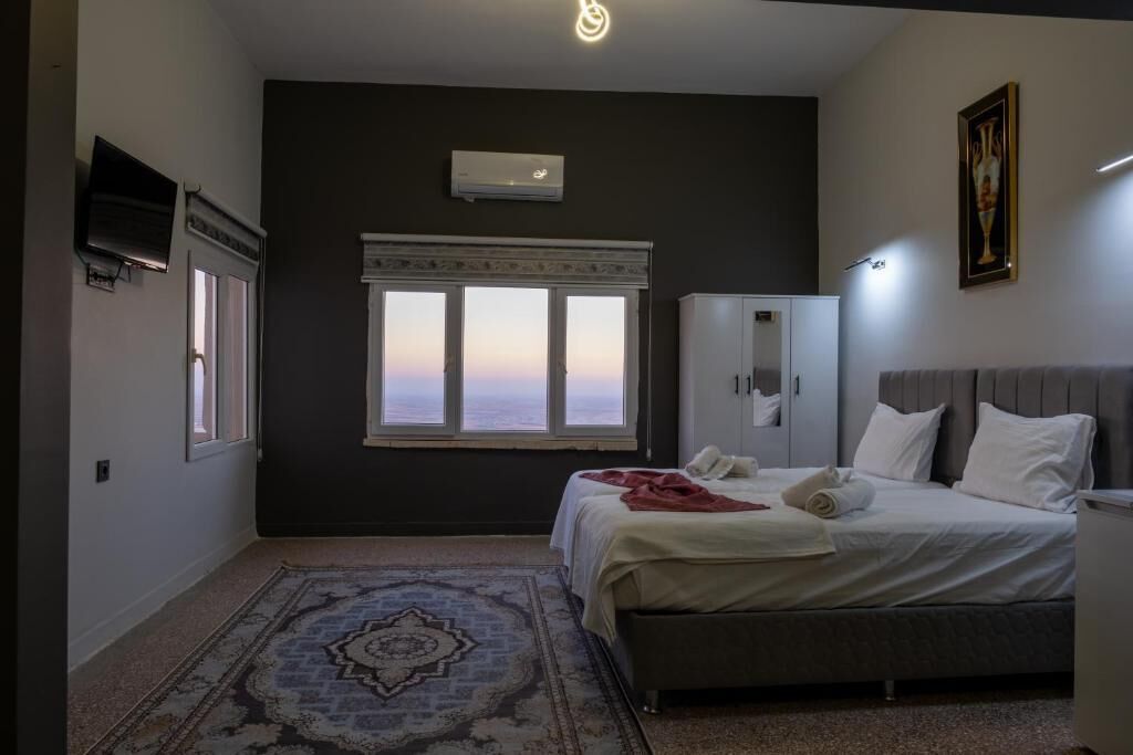 Habitación cuádruple familiar, balcón, vistas a la ciudad | Wifi gratis