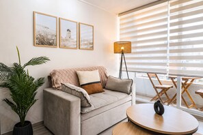 Apartamento standard | Cortinas blackout, ferros/tábuas de passar roupa, Wi-Fi de cortesia
