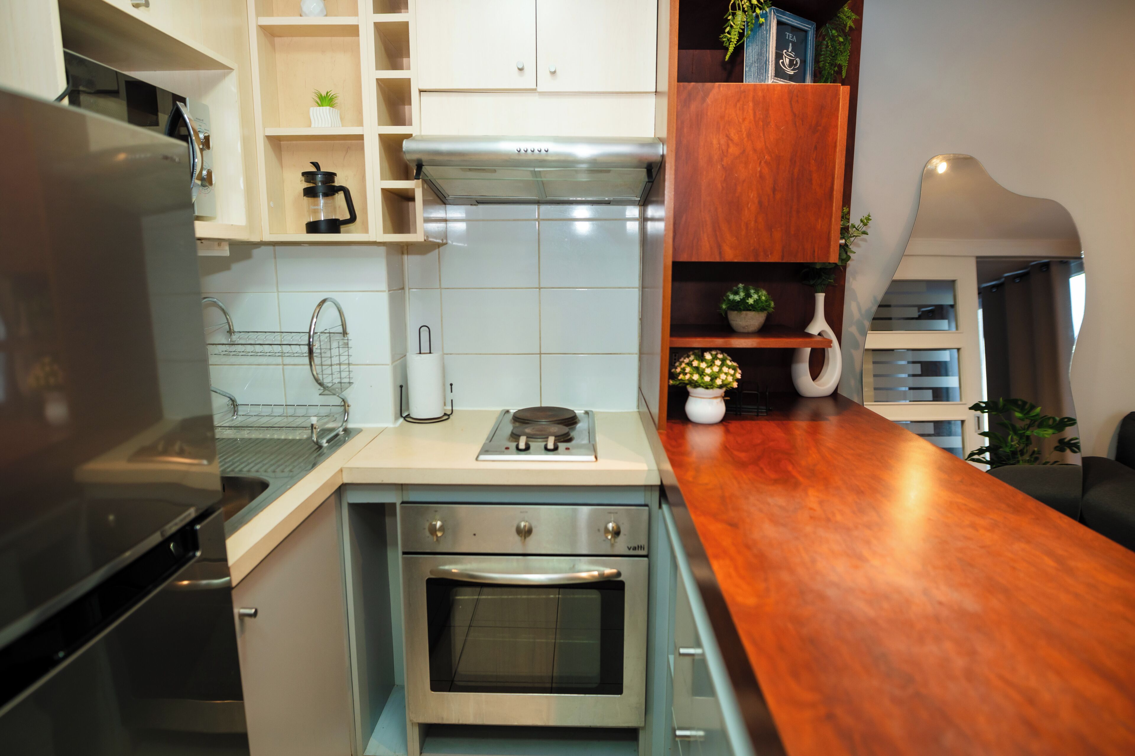 Appartement | Cuisine privée | Grand réfrigérateur, micro-ondes, four, plaque de cuisson