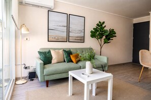 Apartamento standard | Roupas de cama premium, edredons de pluma, ferros/tábuas de passar roupa