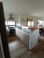 Cabin, Patio, Garden View | Private kitchen | Full-size fridge, microwave, oven, stovetop