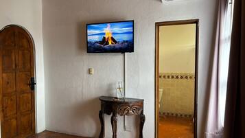 Deluxe Suite, Balcony, Courtyard View | In-room safe, blackout drapes, iron/ironing board, free WiFi