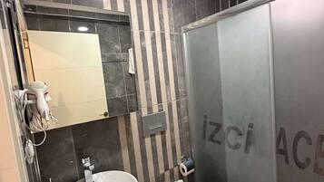 Shower, free toiletries, towels, soap