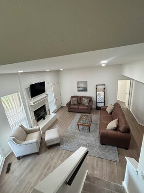 Smart TV, fireplace, books