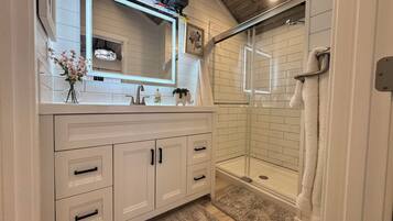 Hair dryer, towels, soap, toilet paper